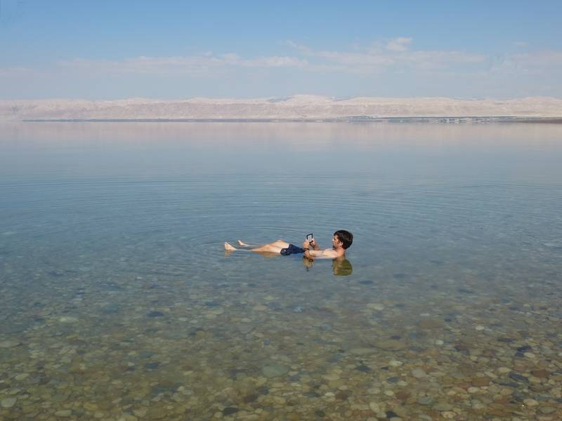 Floating in the dead sea in Jordan